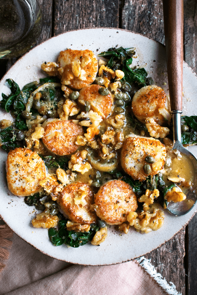 Lemon Butter Scallops With Greens & Walnuts