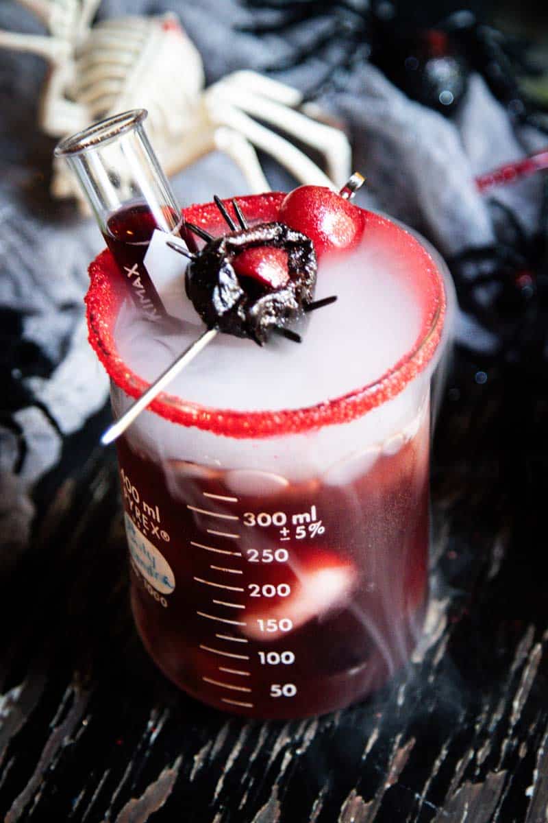 A Spooky Dark Cosmo Cocktail